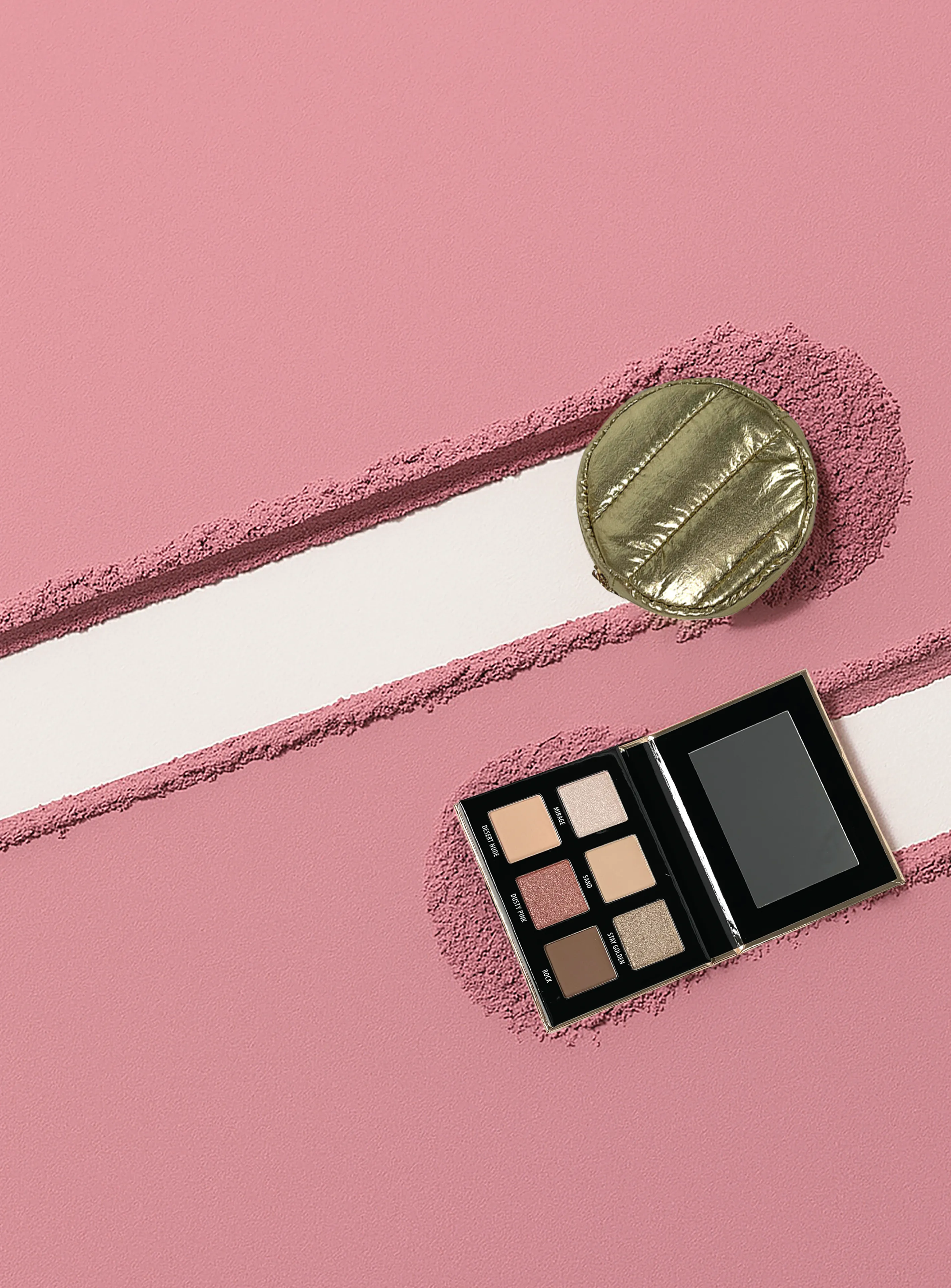 A sleek eyeshadow palette with neutral tones and a round metallic compact